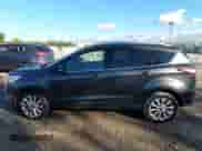 2017 Ford Escape Titanium with VIN 1FMCU9J94HUB03828, listed as a IAAI auction lot 43336898 with 164,743 mi miles and . Bid and sale history available at DreamBid. Image 14.