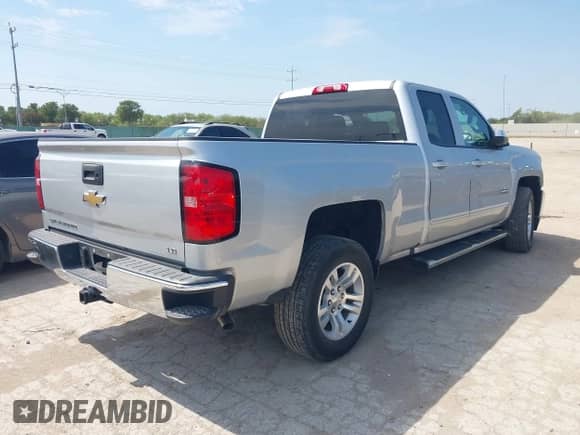 2019 Chevrolet Silverado 1500 LT with VIN 2GCRCPEC7K1238784, listed as a IAAI auction lot 43013449 with 27,381 mi miles and . Bid and sale history available at DreamBid. Image 4.