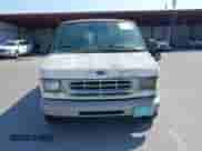 1999 Ford Econoline Cargo with VIN 1FTRE1428XHA20390, listed as a IAAI auction lot 41806875 with 207,954 mi miles and . Bid and sale history available at DreamBid. Image 6.