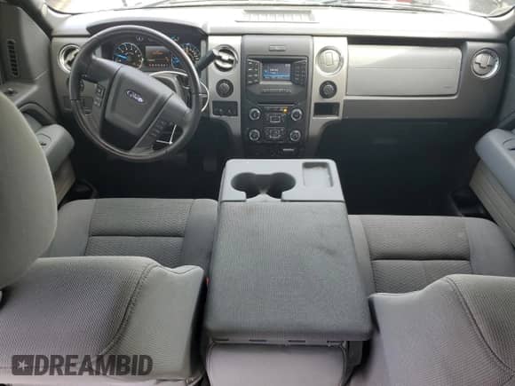 2014 Ford F-150 XLT с VIN 1FTFW1CT1EKE22892, выставлен на аукционе Copart как лот 86332765 с пробегом 14 203 миль миль и Списание • Salvage title. История ставок и продаж доступна на DreamBid. Изображение 8.