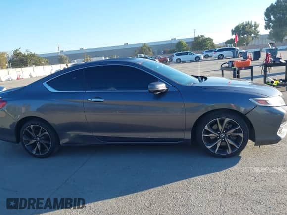 2017 Honda Accord Touring with VIN 1HGCT2B07HA004373, listed as a IAAI auction lot 43365975 with 140,599 mi miles and . Bid and sale history available at DreamBid. Image 13.