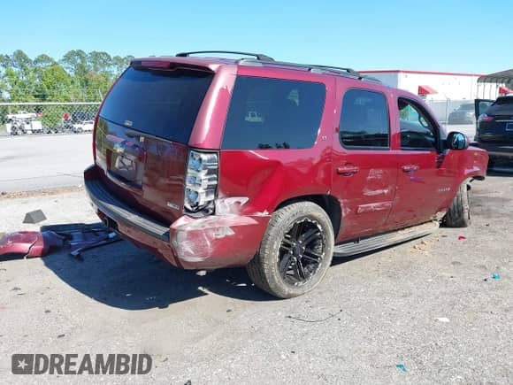 2009 Chevrolet Tahoe 2LT z VIN 1GNFK23059R125278, wystawiony jako IAAI lot #42059416 z przebiegiem 174 502 mil mil oraz . Historia ofert i sprzedaży dostępna na DreamBid. Obrazek 4.