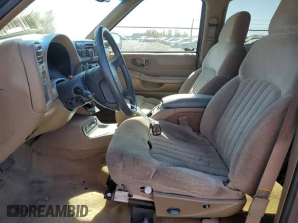 1998 Chevrolet Blazer LS with VIN 1GNDT13W4W2133251, listed as a Copart auction lot 64845125 with Not provided miles and Salvage title. Bid and sale history available at DreamBid. Image 7.