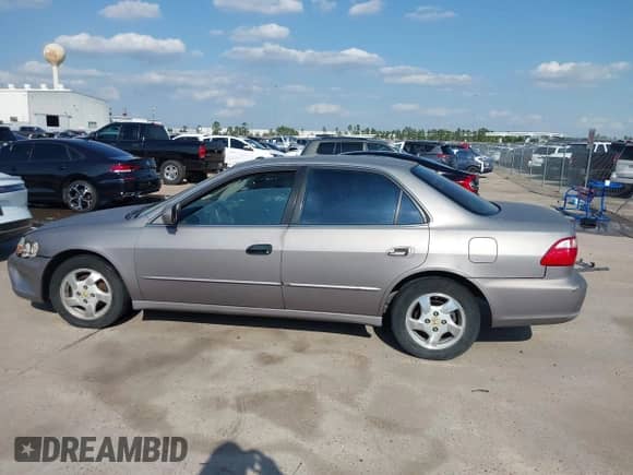 2000 Honda Accord EX with VIN JHMCG5669YC036358, listed as a IAAI auction lot 41792434 with 196,941 mi miles and . Bid and sale history available at DreamBid. Image 14.