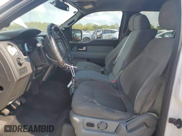 2012 Ford F-150 FX4 with VIN 1FTFW1EF9CKD19515, listed as a Copart auction lot 85183435 with 225,659 mi miles and Salvage title. Bid and sale history available at DreamBid. Image 7.