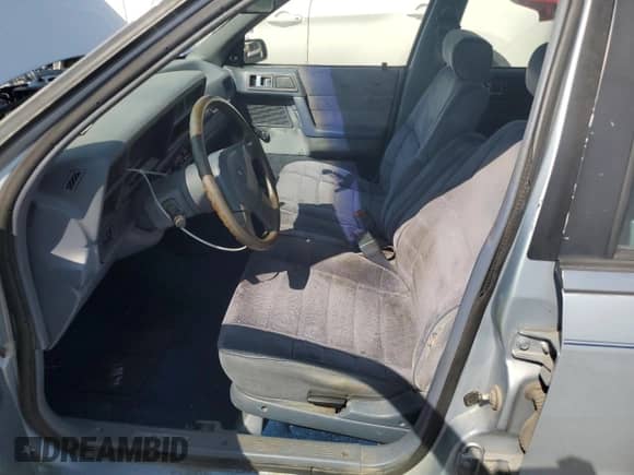 1989 Dodge Spirit with VIN 1B3BA46K1KF408949, listed as a Copart auction lot 80767594 with 137,766 mi miles and Non repairable. Bid and sale history available at DreamBid. Image 7.