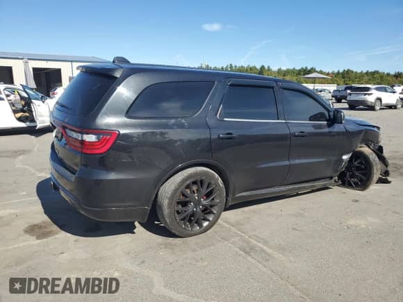 2016 Dodge Durango R/T with VIN 1C4SDJCT6GC352453, listed as a Copart auction lot 84751075 with 171,389 mi miles and Salvage title. Bid and sale history available at DreamBid. Image 3.