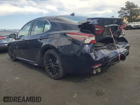 2022 Toyota Camry XSE with VIN 4T1K61BK1NU053720, listed as a Copart auction lot 70303225 with 36,865 mi miles and Salvage title. Bid and sale history available at DreamBid. Image 2.