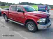 2014 Ram 1500 Big Horn z VIN 1C6RR7LT0ES399734, wystawiony jako IAAI lot #42877062 z przebiegiem 167 919 mil mil oraz . Historia ofert i sprzedaży dostępna na DreamBid. Obrazek 1.