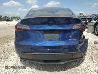 2022 Tesla Model Y Performance with VIN 7SAYGDEF6NF455028, listed as a Copart auction lot 61740254 with 26,869 mi miles and Salvage title. Bid and sale history available at DreamBid. Image 6.