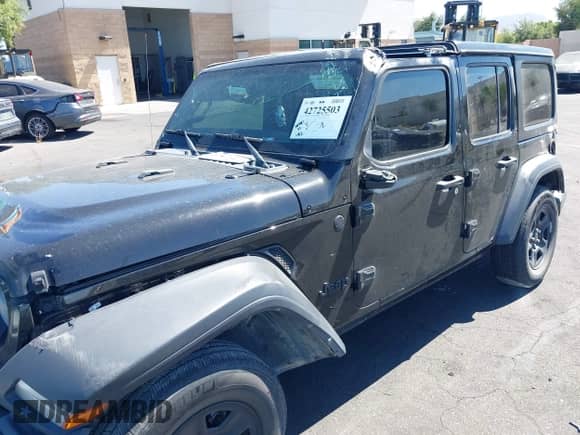 2023 Jeep Wrangler Sport S with VIN 1C4HJXDG7PW617662, listed as a IAAI auction lot 42725503 with Not provided miles and . Bid and sale history available at DreamBid. Image 6.