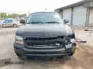 2014 Chevrolet Tahoe Commercial z VIN 1GNLC2E03ER212670, wystawiony jako IAAI lot #42397479 z przebiegiem 106 756 mil mil oraz . Historia ofert i sprzedaży dostępna na DreamBid. Obrazek 12.