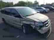 2013 Dodge Grand Caravan SE with VIN 2C4RDGBG2DR792176, listed as a IAAI auction lot 42935102 with 105,683 mi miles and . Bid and sale history available at DreamBid. Image 1.