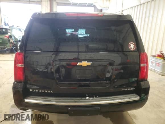 2019 Chevrolet Suburban Premier z VIN 1GNSKJKC1KR295079, wystawiony jako Copart lot #61539555 z przebiegiem 123 956 mil mil oraz Nie do naprawy • Non repairable. Historia ofert i sprzedaży dostępna na DreamBid. Obrazek 6.