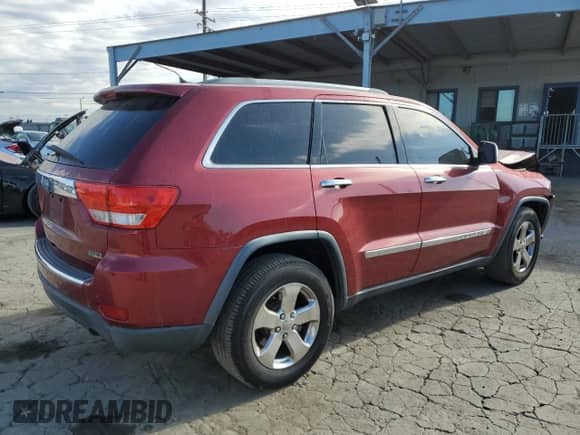 2013 Jeep Grand Cherokee Limited с VIN 1C4RJEBG5DC656954, выставлен на аукционе Copart как лот 82373845 с пробегом 148 213 миль миль и Списание • Salvage title. История ставок и продаж доступна на DreamBid. Изображение 3.
