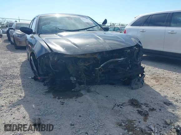 2015 Dodge Charger Police z VIN 2C3CDXAG2FH890743, wystawiony jako IAAI lot #43327061 z przebiegiem 12 mil mil oraz . Historia ofert i sprzedaży dostępna na DreamBid. Obrazek 6.