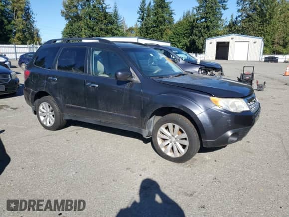 2011 Subaru Forester X Premium with VIN JF2SHADC2BH700961, listed as a Copart auction lot 85589305 with Not provided miles and Clean title. Bid and sale history available at DreamBid. Image 4.