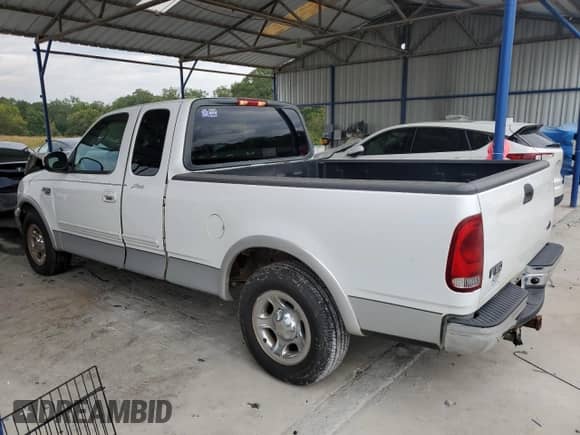 2002 Ford F-150 XL с VIN 1FTRX17L72NB31506, выставлен на аукционе Copart как лот 83773615 с пробегом Не указан миль и Списание • Salvage title. История ставок и продаж доступна на DreamBid. Изображение 2.