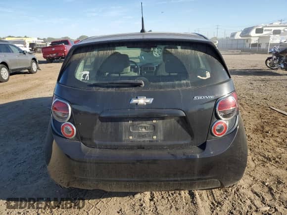 2014 Chevrolet Sonic LS с VIN 1G1JB6SH2E4233357, выставлен на аукционе Copart как лот 73169684 с пробегом 176 688 миль миль и Списание • Salvage title. История ставок и продаж доступна на DreamBid. Изображение 6.