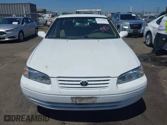 1997 Toyota Camry LE z VIN JT2BF22K6V0052184, wystawiony jako IAAI lot #42608245 z przebiegiem 188 191 mil mil oraz . Historia ofert i sprzedaży dostępna na DreamBid. Obrazek 12.