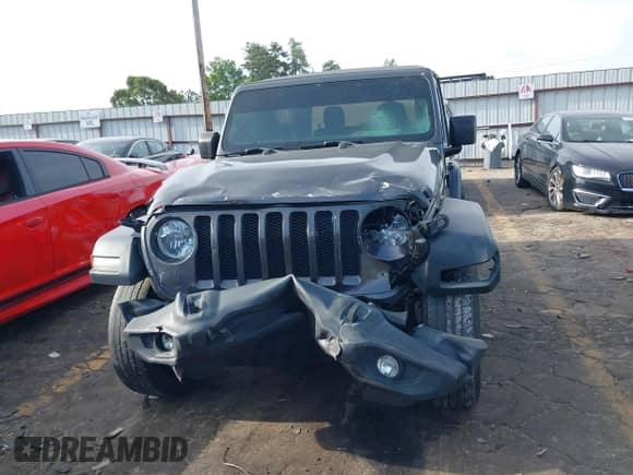 2020 Jeep Wrangler Sport S with VIN 1C4GJXAG9LW303604, listed as a IAAI auction lot 42221305 with 71,189 mi miles and . Bid and sale history available at DreamBid. Image 6.