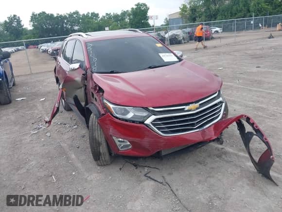 2020 Chevrolet Equinox Premier z VIN 2GNAXXEV0L6176692, wystawiony jako IAAI lot #42742557 z przebiegiem 63 026 mil mil oraz . Historia ofert i sprzedaży dostępna na DreamBid. Obrazek 1.