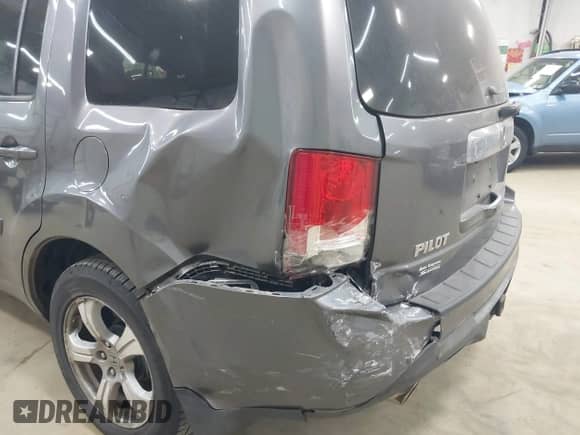 2014 Honda Pilot EX-L z VIN 5FNYF4H52EB024950, wystawiony jako IAAI lot #42874943 z przebiegiem 164 315 mil mil oraz . Historia ofert i sprzedaży dostępna na DreamBid. Obrazek 6.