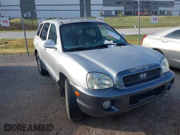 2003 Hyundai Santa Fe GLS z VIN KM8SC13D73U373131, wystawiony jako IAAI lot #43536969 z przebiegiem 270 848 mil mil oraz . Historia ofert i sprzedaży dostępna na DreamBid. Obrazek 1.