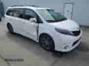 2015 Toyota Sienna SE with VIN 5TDXK3DC8FS656354, listed as a Copart auction lot 86177875 with 192,471 mi miles and Salvage title. Bid and sale history available at DreamBid. Image 4.