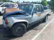 1990 Dodge Dakota z VIN 1B7FL23X0LS641390, wystawiony jako IAAI lot #42826429 z przebiegiem 186 919 mil mil oraz . Historia ofert i sprzedaży dostępna na DreamBid. Obrazek 2.