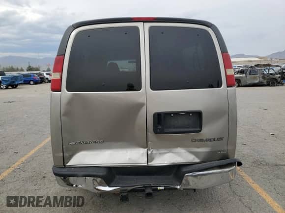 2003 Chevrolet Express Passenger with VIN 1GAHG39U631107387, listed as a Copart auction lot 70873805 with 217,147 mi miles and Salvage title. Bid and sale history available at DreamBid. Image 6.