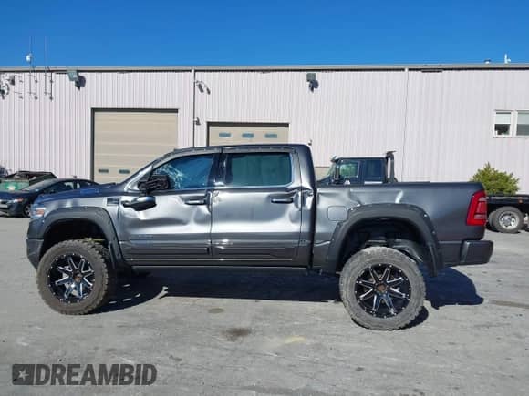 2019 Ram 1500 Limited z VIN 1C6SRFHT4KN588563, wystawiony jako IAAI lot #43503144 z przebiegiem 54 603 mil mil oraz . Historia ofert i sprzedaży dostępna na DreamBid. Obrazek 14.