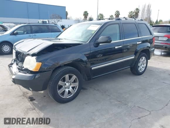 2009 Jeep Grand Cherokee with VIN 1J8HS68T49C524111, listed as a IAAI auction lot 41605917 with 133,441 mi miles and . Bid and sale history available at DreamBid. Image 2.