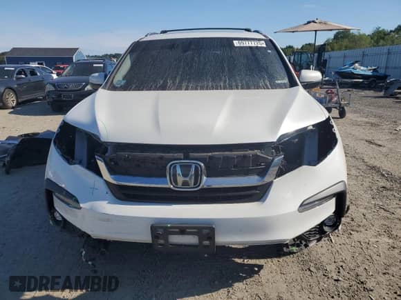 2022 Honda Pilot Touring 7-Passenger with VIN 5FNYF6H62NB007148, listed as a Copart auction lot 69777725 with 54,748 mi miles and Salvage title. Bid and sale history available at DreamBid. Image 5.