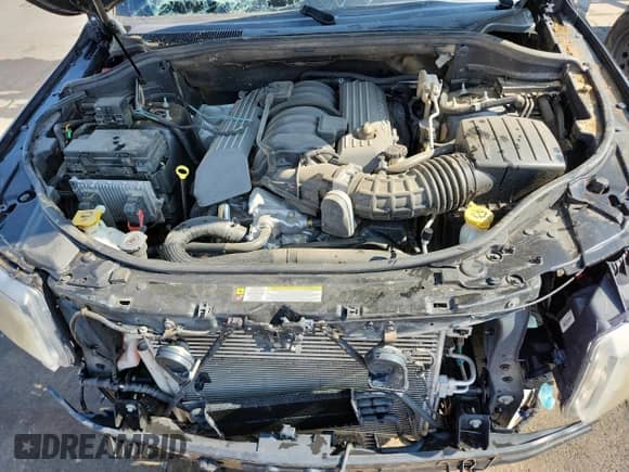 2012 Jeep Grand Cherokee SRT-8 z VIN 1C4RJFDJ6CC351718, wystawiony jako Copart lot #70483635 z przebiegiem 110 822 mil mil oraz Szkoda całkowita • Salvage title. Historia ofert i sprzedaży dostępna na DreamBid. Obrazek 12.