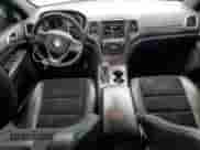 2018 Jeep Grand Cherokee Altitude z VIN 1C4RJFAG7JC167782, wystawiony jako Copart lot #83775285 z przebiegiem 98 035 mil mil oraz Szkoda całkowita • Salvage title. Historia ofert i sprzedaży dostępna na DreamBid. Obrazek 8.