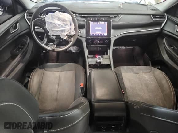 2023 Jeep Grand Cherokee Altitude with VIN 1C4RJHAG4PC543746, listed as a Copart auction lot 71586265 with 70,824 mi miles and Salvage title. Bid and sale history available at DreamBid. Image 8.