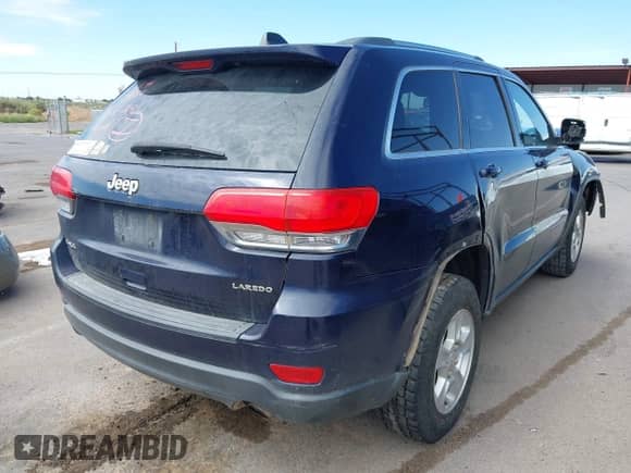 2015 Jeep Grand Cherokee Altitude z VIN 1C4RJFAG9FC636541, wystawiony jako IAAI lot #43100672 z przebiegiem 149 821 mil mil oraz . Historia ofert i sprzedaży dostępna na DreamBid. Obrazek 4.