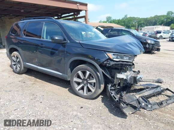 2024 Honda Pilot Touring with VIN 5FNYG1H77RB024994, listed as a IAAI auction lot 42672752 with 23,740 mi miles and . Bid and sale history available at DreamBid. Image 1.