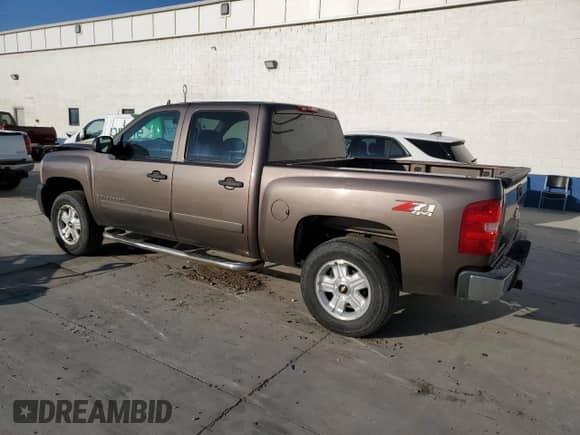 2008 Chevrolet Silverado 1500 LTZ with VIN 2GCEK13M981163623, listed as a Copart auction lot 70932835 with 158,096 mi miles and Salvage title. Bid and sale history available at DreamBid. Image 2.