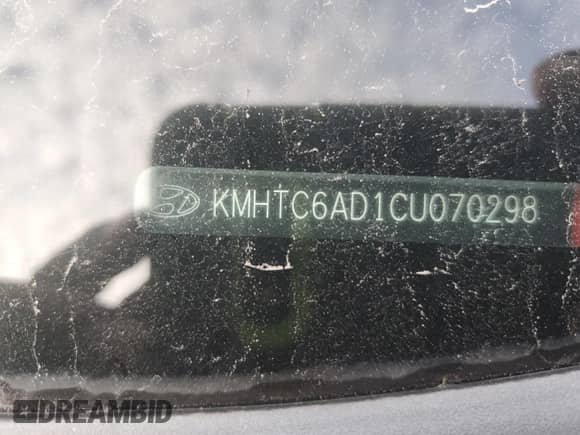 2012 Hyundai Veloster w/Red Int z VIN KMHTC6AD1CU070298, wystawiony jako Copart lot #71091355 z przebiegiem 144 305 mil mil oraz Czysty tytuł • Clean title. Historia ofert i sprzedaży dostępna na DreamBid. Obrazek 12.