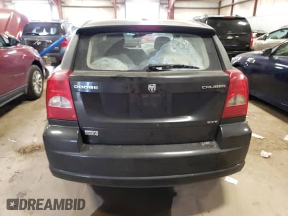 2010 Dodge Caliber SXT z VIN 1B3CB4HA7AD619122, wystawiony jako Copart lot #36925394 z przebiegiem 132 315 mil mil oraz Czysty tytuł • Clean title. Historia ofert i sprzedaży dostępna na DreamBid. Obrazek 6.