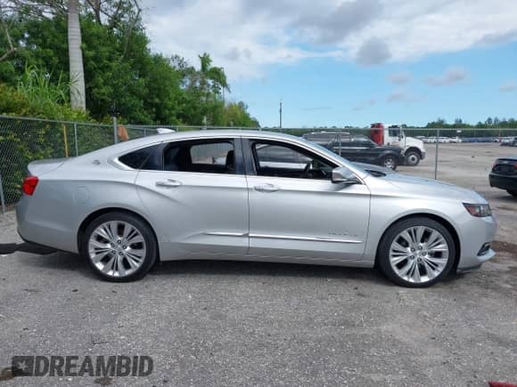2018 Chevrolet Impala Premier with VIN 2G1125S34J9107734, listed as a IAAI auction lot 43353768 with 61,408 mi miles and . Bid and sale history available at DreamBid. Image 13.
