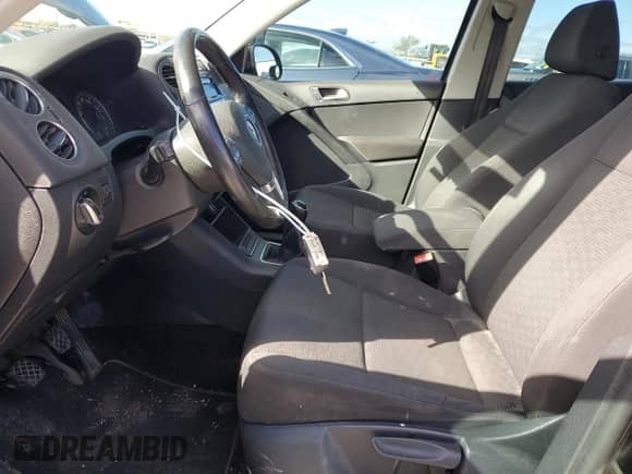 2014 Volkswagen Tiguan с VIN WVGCV3AXXEW604117, выставлен на аукционе Copart как лот 78791874 с пробегом 194 837 миль миль и Списание • Salvage title. История ставок и продаж доступна на DreamBid. Изображение 7.