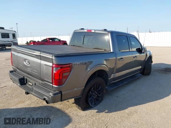 2025 Ford F-150 Lariat with VIN 1FTFW5L80SFA02693, listed as a IAAI auction lot 42893311 with 8,328 mi miles and . Bid and sale history available at DreamBid. Image 4.