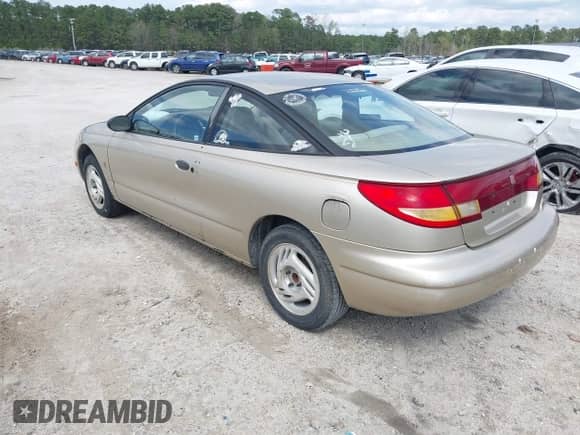 1997 Saturn SC with VIN 1G8ZE1285VZ125476, listed as a IAAI auction lot 41832482 with 186,269 mi miles and . Bid and sale history available at DreamBid. Image 3.