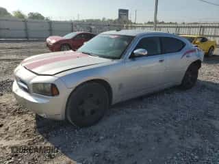 2009 Dodge Charger SXT с VIN 2B3KA33V39H554643, выставлен на аукционе Copart как лот 71962974 с пробегом 186 688 миль миль и Списание • Salvage title. История ставок и продаж доступна на DreamBid. Изображение 1.