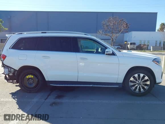 2018 Mercedes-Benz GLS 450 with VIN 4JGDF6EEXJB153297, listed as a IAAI auction lot 41217775 with 119,716 mi miles and . Bid and sale history available at DreamBid. Image 14.