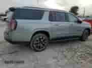 2023 Chevrolet Suburban RST z VIN 1GNSKEKD7PR400876, wystawiony jako Copart lot #84726094 z przebiegiem 17 741 mil mil oraz Szkoda całkowita • Salvage title. Historia ofert i sprzedaży dostępna na DreamBid. Obrazek 3.