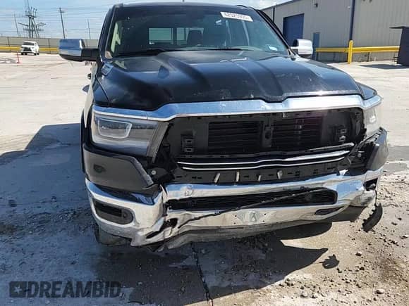 2020 Ram 1500 Laramie z VIN 1C6SRFJM7LN250529, wystawiony jako Copart lot #62525905 z przebiegiem 97 707 mil mil oraz Szkoda całkowita • Salvage title. Historia ofert i sprzedaży dostępna na DreamBid. Obrazek 13.